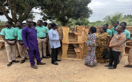 Distribution of school desks by the Hon DCE to the various schools